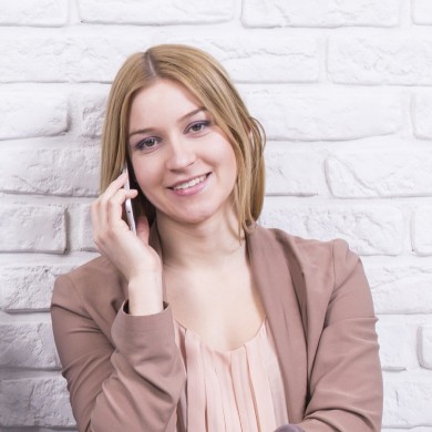 Smiling woman on the phone